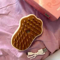 Spazzola Pawvella Paw setole morbide in silicone e ricarica USB per pulizia e benessere per cani e gatti